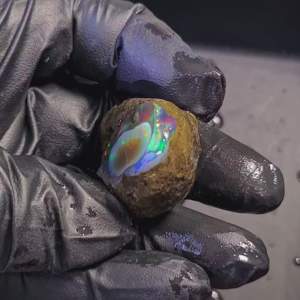 122Carats | Ethiopian Phantom Water Opal Specimen grade | Brilliant play of colour| 36x30mm